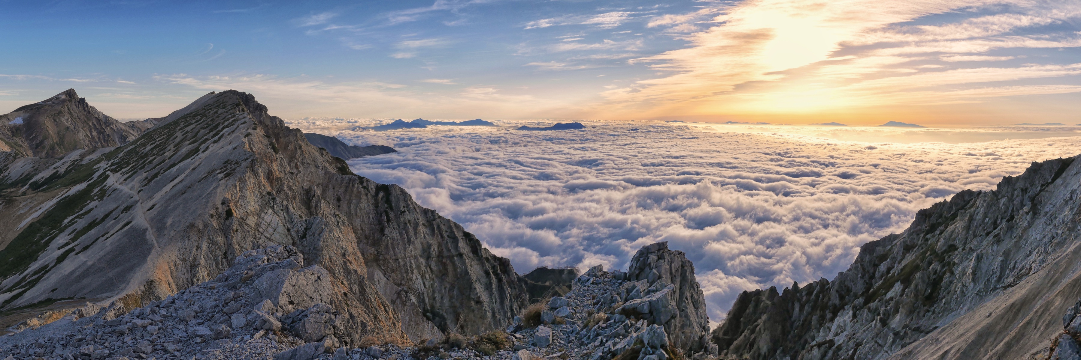 Rock ridge above a sea of clouds in the Japan Northern Alps