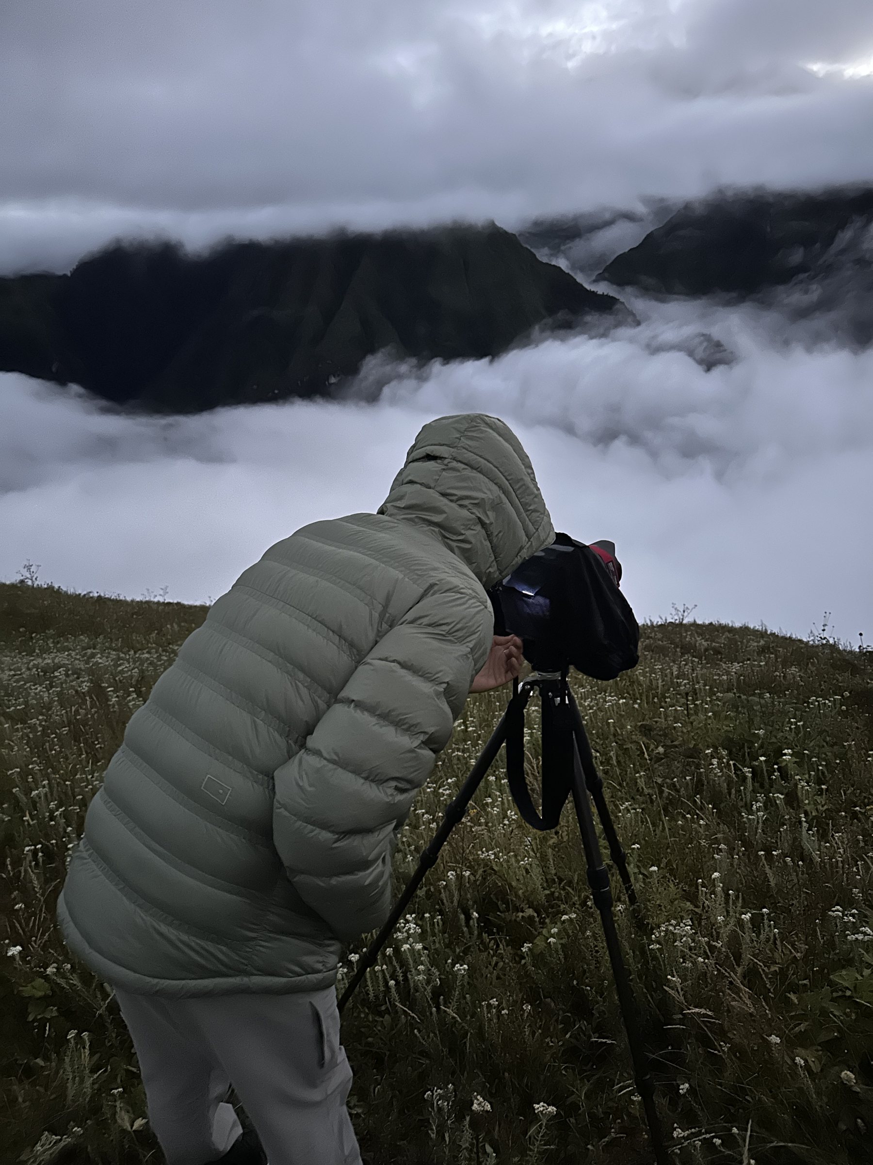 Jo Deok Rae operating a camera above the clouds in Gurja